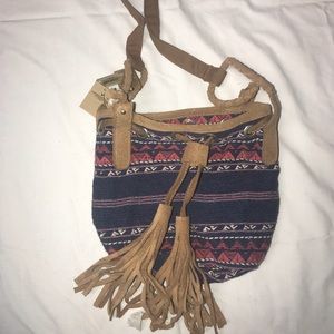 Crossbody tribal print bucket bag